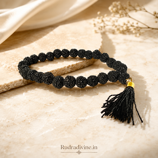 Black Rudraksha Mala 27+1 Beads crafted with natural 8MM Rudraksha beads and official Lab Certificate by Rudradivine for meditation, protection and spiritual wellness.
