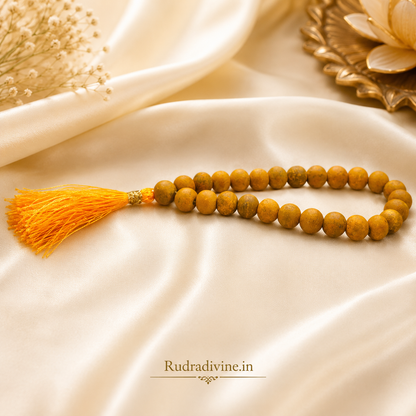 Haldi Mala 27+1 Beads 7-8MM crafted with natural turmeric beads and official Lab Certificate by Rudradivine for prosperity, Guru blessings, meditation, and spiritual devotion.