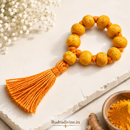 Haldi Mala 9+1 Beads 7-8MM crafted with natural turmeric beads and official Lab Certificate by Rudradivine for prosperity, Guru blessings, and spiritual devotion.