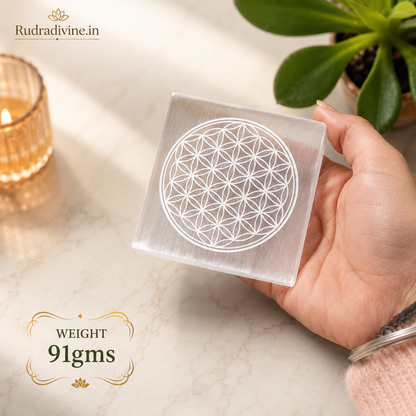 Lab Certified Selenite Crystal Charging Plate with Flower of Life engraved design crafted from genuine natural Selenite by Rudradivine for crystal cleansing, energy charging, meditation and spiritual healing.