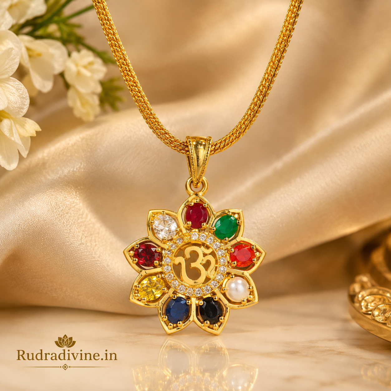 Navratan Locket with sacred Om Symbol and nine-gemstone design, paired with free gold chain by Rudradivine for spiritual and devotional wear.